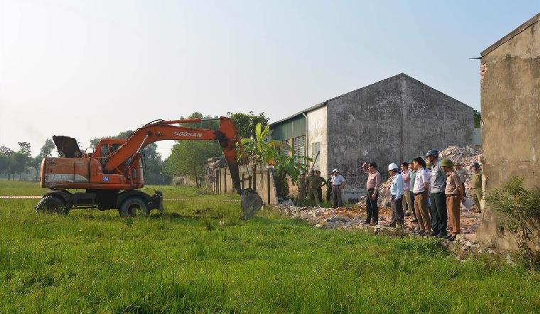 tố cáo cán bộ bao che lấn chiếm đất
